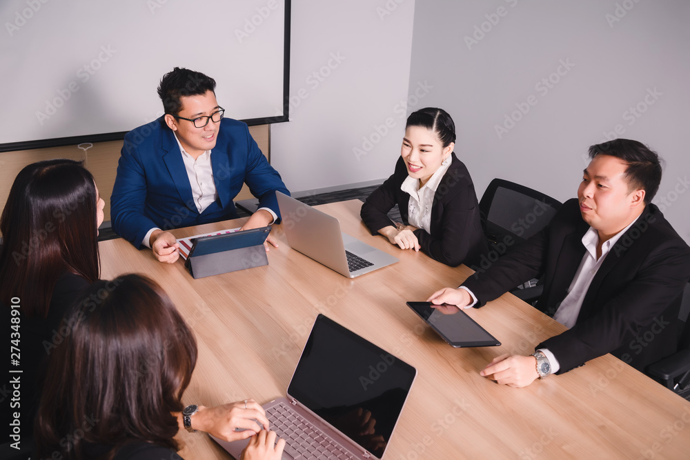 Business people in seminar room. Meeting Corporate Success Brainstorming Teamwork Business people in seminar room. Meeting Corporate Success Brainstorming Teamwork