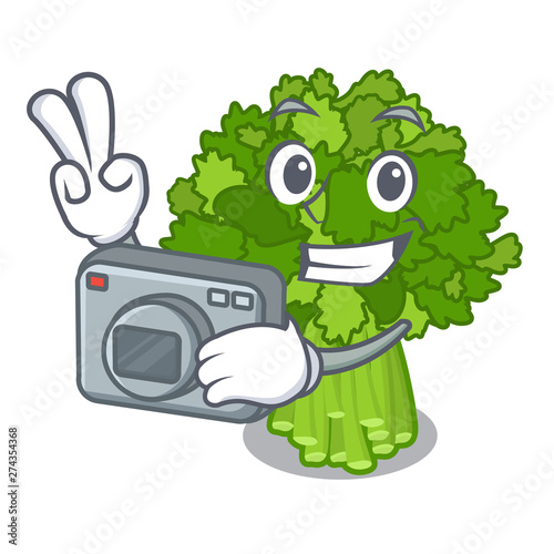 Photographer rabe broccoli in vegetable mascot basket