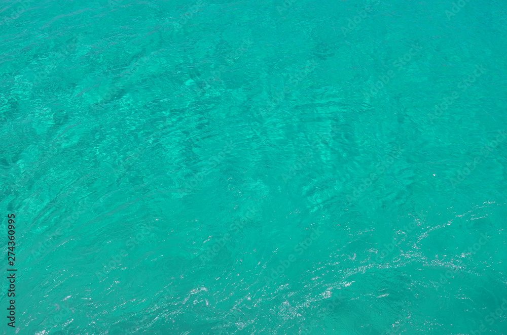 Sea transparent clear water. Flowing water surface