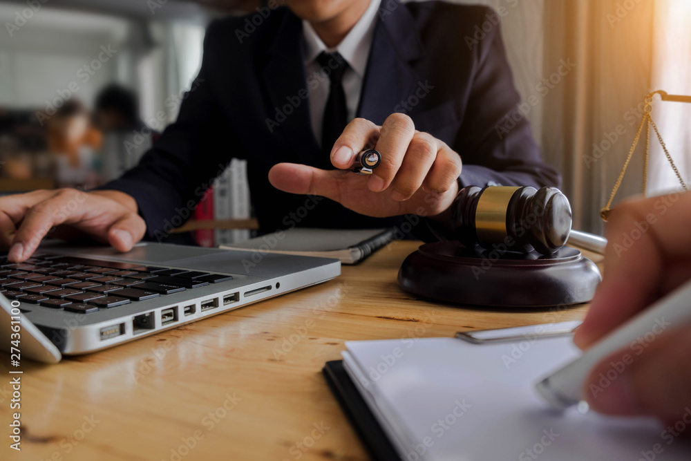 Businessman and Male lawyer or judge consult having team meeting with client, Law and Legal services concept in office.