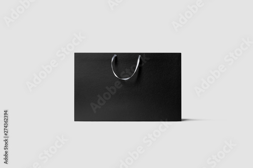 Black Paper Bag Mock up isolated on light gray background.Realistic photo.3D rendering