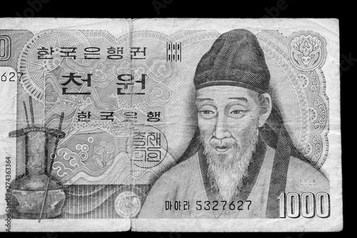 Outdated 1000 Korean Won banknote of 1983 year close up. Black and white