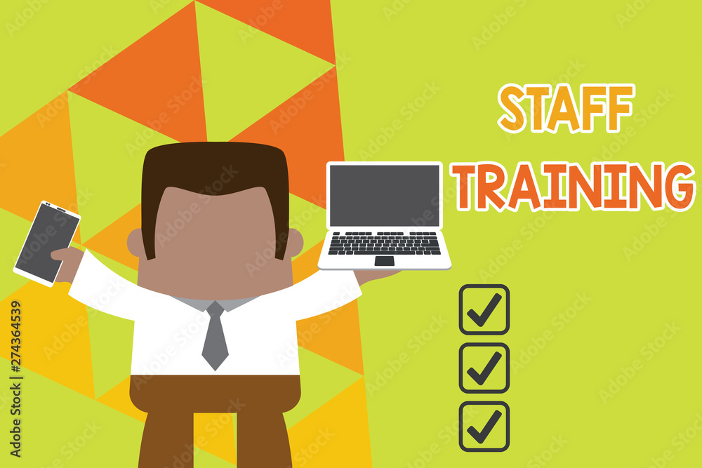 Conceptual hand writing showing Staff Training. Concept meaning program that helps employees learn specific knowledge Professional man holding laptop in left mobile phone right Conceptual hand writing showing Staff Training. Concept meaning program that helps employees learn specific knowledge Professional man holding laptop in left mobile phone right