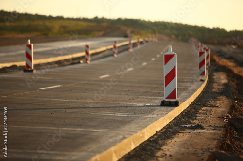 Construction of the road of modern concrete high-speed highway. © Elroi