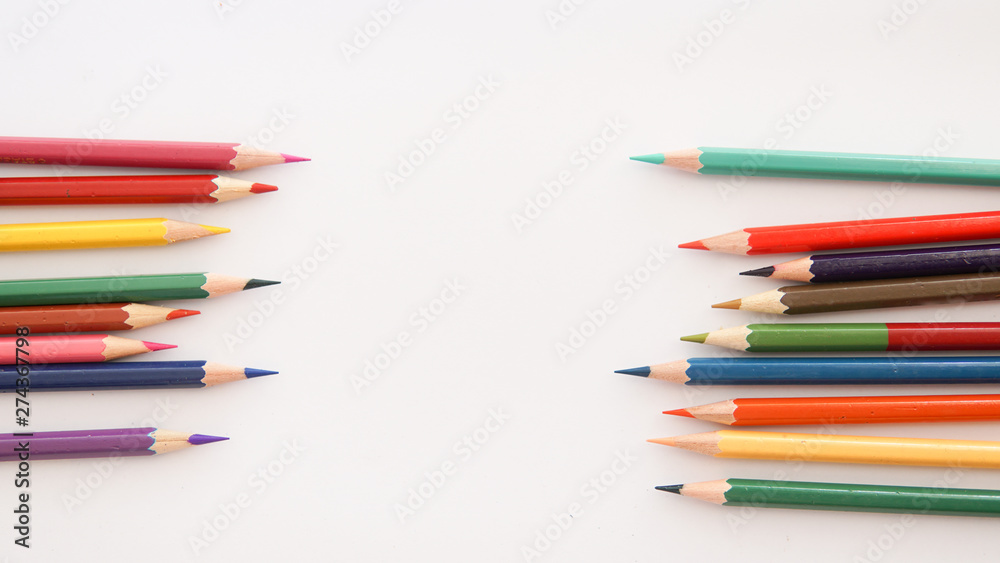 colored pencils on white background with copy space colored pencils on white background with copy space