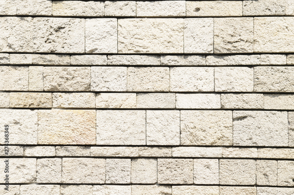 Fototapeta premium ベージュ色の石壁