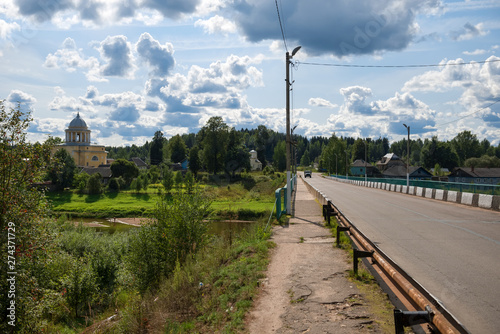 Bridge across the Msta River between the villages of Lyubytino and Bor, Lyubytinsky District, Novgorod Region, Russia photo