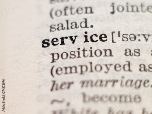 Dictionary definition of word service, selective focus.