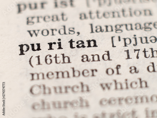 Bild auf Leinwand Dictionary definition of word puritan, selective focus.