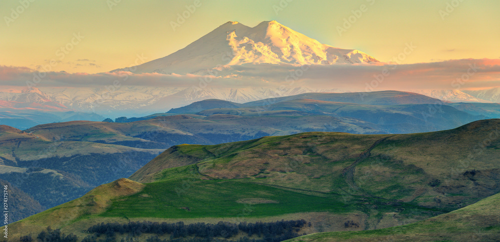 Panoramic view of Elbrus mountain in late evening.