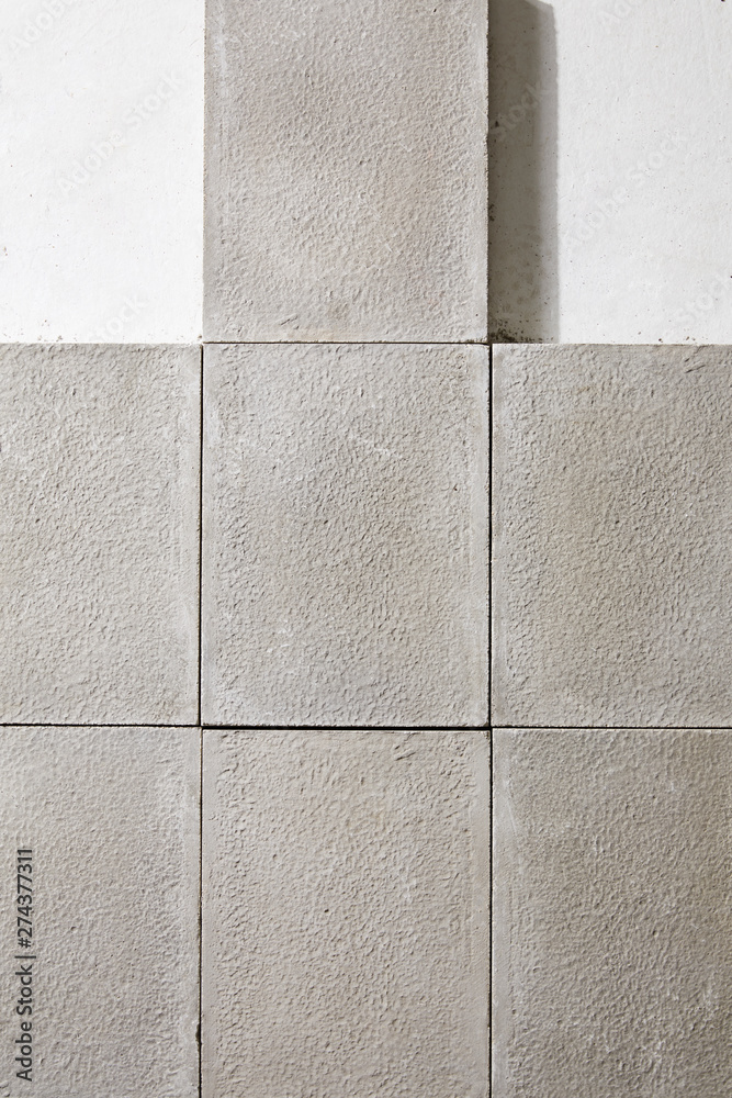 Fototapeta premium Grey stone bricks on the floor with two white empty area.