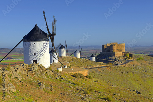 Castle and windmills at Consuegra, Toledo region, Castilla La Mancha, Spain. Route of Don Quixote with windmills.