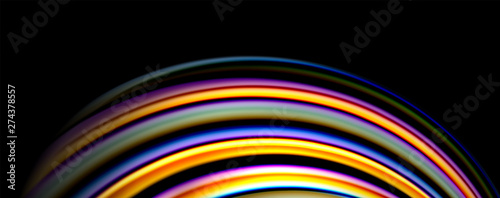 Fluid color swirls on black. Modern background with trendy design