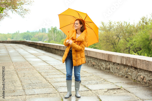 Beautiful young woman with ...