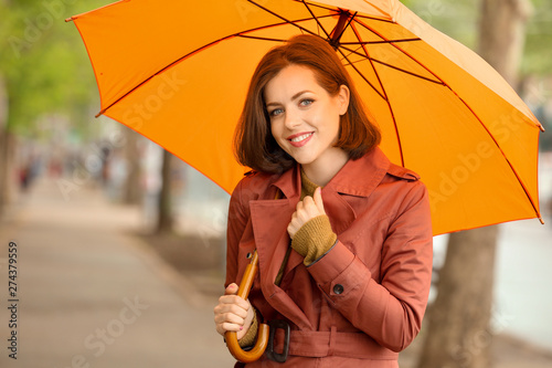 Beautiful young woman with ...