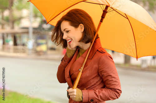 Beautiful young woman with ...