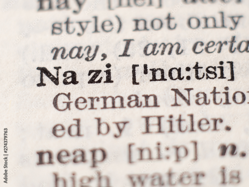 Dictionary definition of word Nazi, selective focus. Dictionary definition of word Nazi, selective focus.
