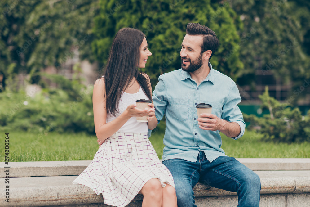 Portrait of cute lovely romantic romance person have dialogue communicate fun conversation tell talk speak say sit bench town outside denim jeans dress skirt white bearded hug embrace Portrait of cute lovely romantic romance person have dialogue communicate fun conversation tell talk speak say sit bench town outside denim jeans dress skirt white bearded hug embrace