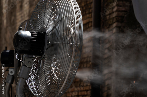 refresher fan with cold water spray photo