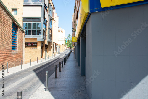 Barcelona, Spain - 25th July 2017 - Long street with posts leading into the uknown