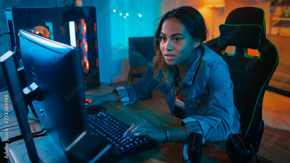 Premium Photo  Girl enjoying her free time by playing video games on  computer in game room