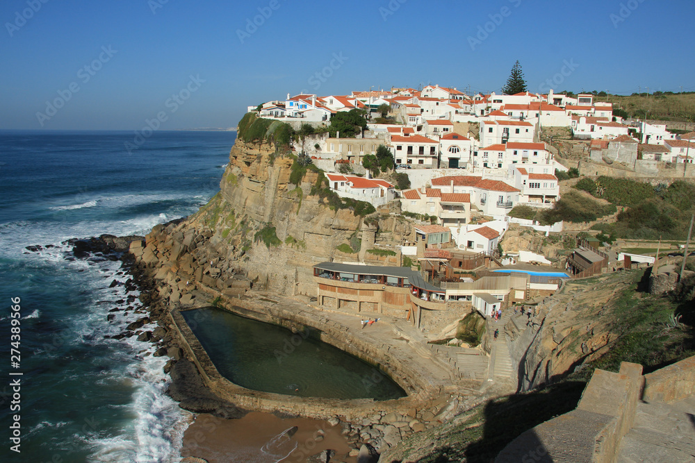 Town on cliff Azenhas do Mar in Portugal
