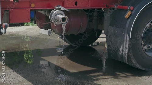 Fuel leaks from a large truck close-up