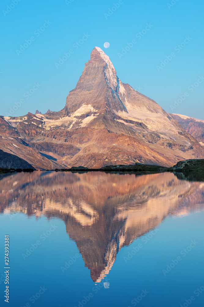 Scenic view on mountain Matterhorn at morning sunrise in Valais region, Switzerland, Europe