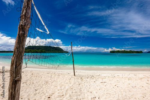 Fototapeta Naklejka Na Ścianę i Meble -  Port Orly sandy beach with palm trees, Espiritu Santo Island, Vanuatu.