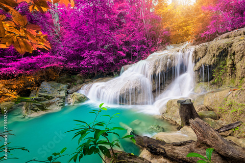Amazing in nature  beautiful waterfall at colorful autumn forest in fall season