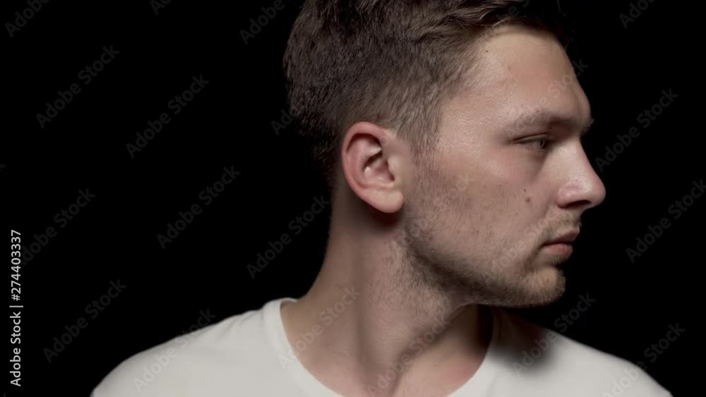 Caucasian man rotating head center to right. Close up shot. Caucasian man rotating head center to right. Close up shot.