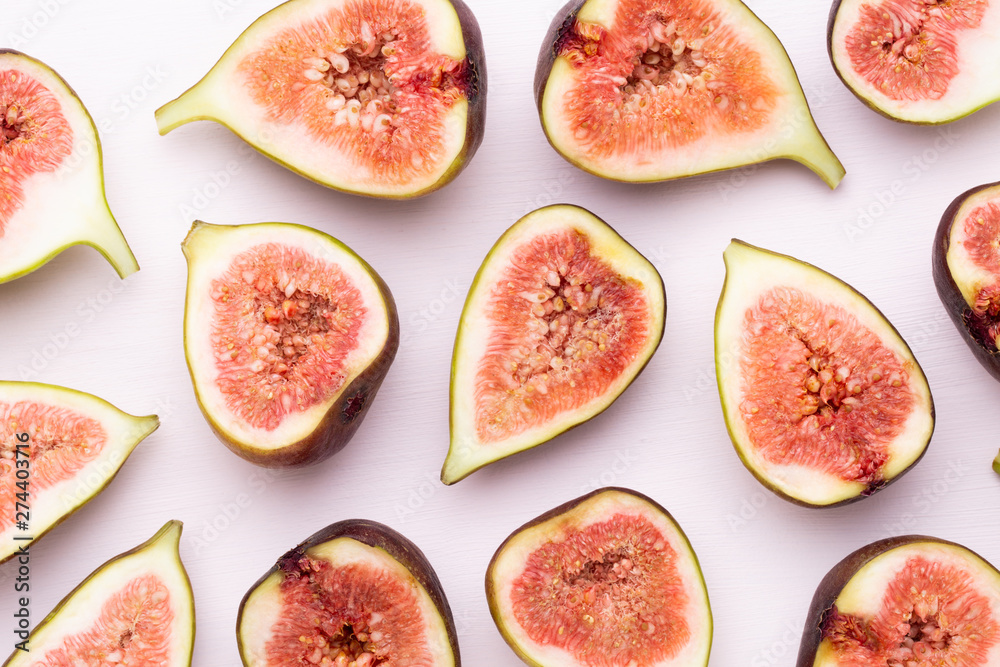 Fig fruits isolated on white background. Top view. Flat lay pattern Fig fruits isolated on white background. Top view. Flat lay pattern