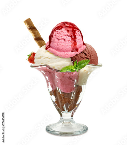 Vanilla, strawberry and chocolate ice cream scoops with sauce or sherbet and wafer stick in sundae cup or glass isolated on white background photo