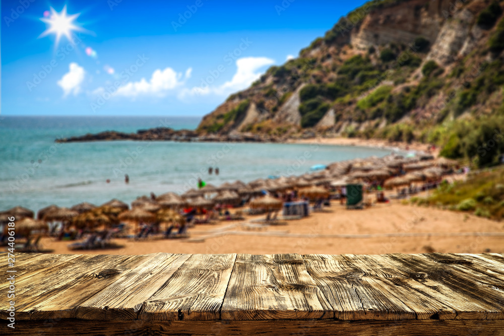 Fototapeta premium Desk of free space and summer beach landscape. 