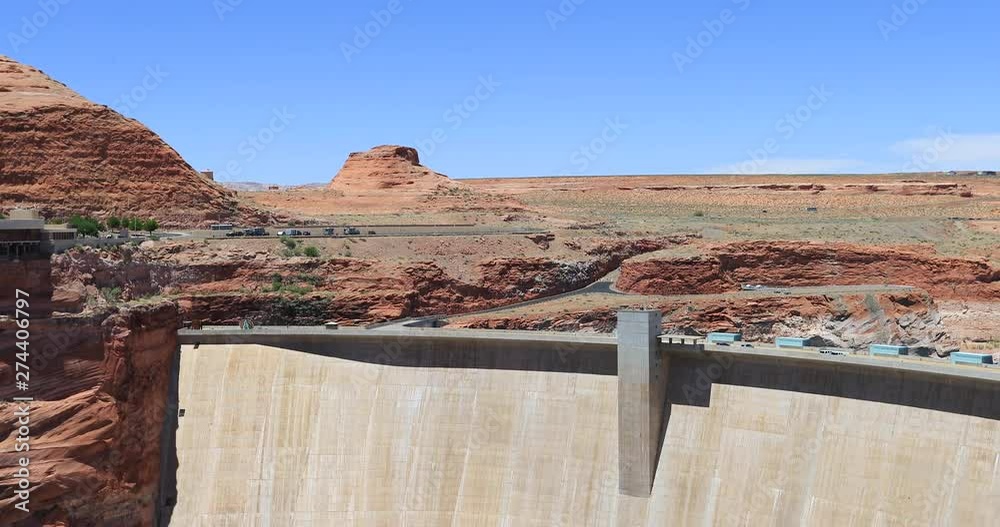Glen Canyon Dam Lake Powell red rocks. U.S. Route 89 across the Colorado River. Industrial power plant. Utah Arizona desert. Drinking, irrigation, recreation and hydro electric power. Glen Canyon Dam Lake Powell red rocks. U.S. Route 89 across the Colorado River. Industrial power plant. Utah Arizona desert. Drinking, irrigation, recreation and hydro electric power.