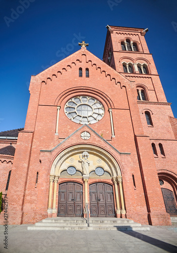 facade of gothic Catholic Church in Poznan...