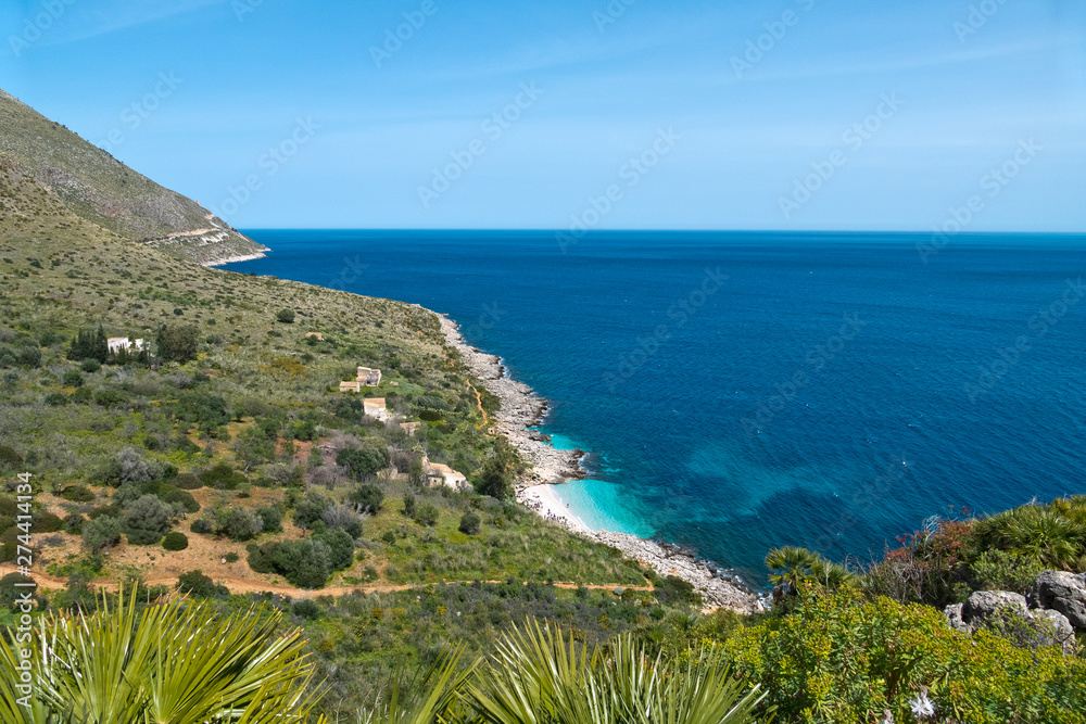 The turquoise sea of Cala dell'Uzzo in the Oasi dello Zingaro natural reserve, San Vito Lo Capo, Sicily