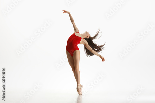 Tableau sur toile Graceful classic ballet dancer or ballerina dancing isolated on white studio background