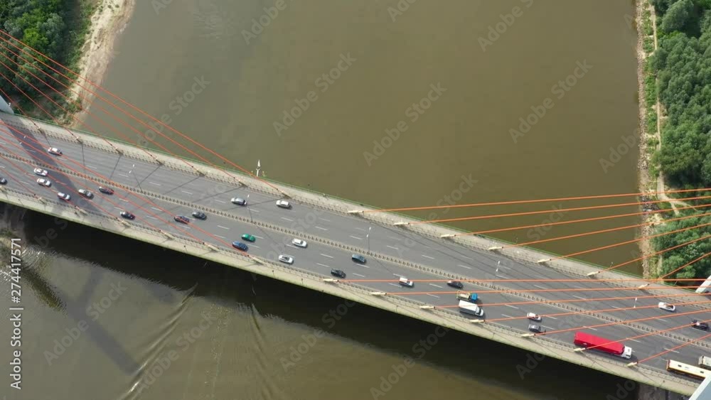 Modern cable stayed bridge and car traffic on background. Highway traffic jam. Aerial View Modern cable stayed bridge and car traffic on background. Highway traffic jam. Aerial View
