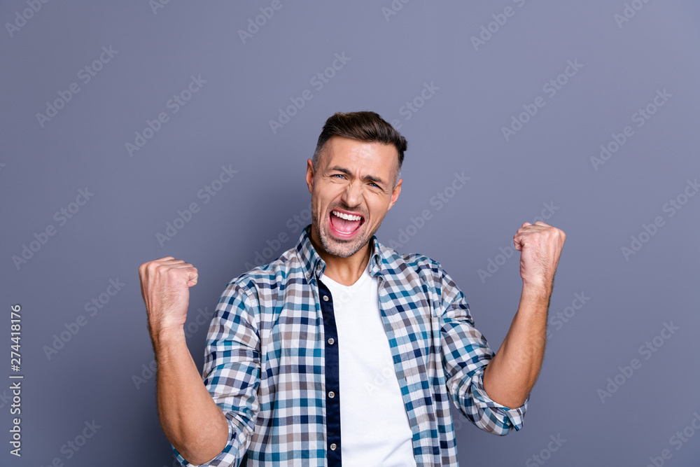 Portrait of his he nice attractive cheerful cheery glad overjoyed bearded guy wearing checked shirt rejoicing satisfactory isolated over blue violet purple pastel background Portrait of his he nice attractive cheerful cheery glad overjoyed bearded guy wearing checked shirt rejoicing satisfactory isolated over blue violet purple pastel background