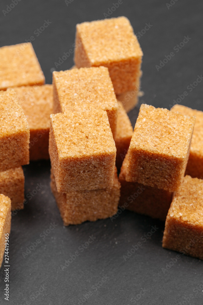 Rock sugar on dark background close up Rock sugar on dark background close up