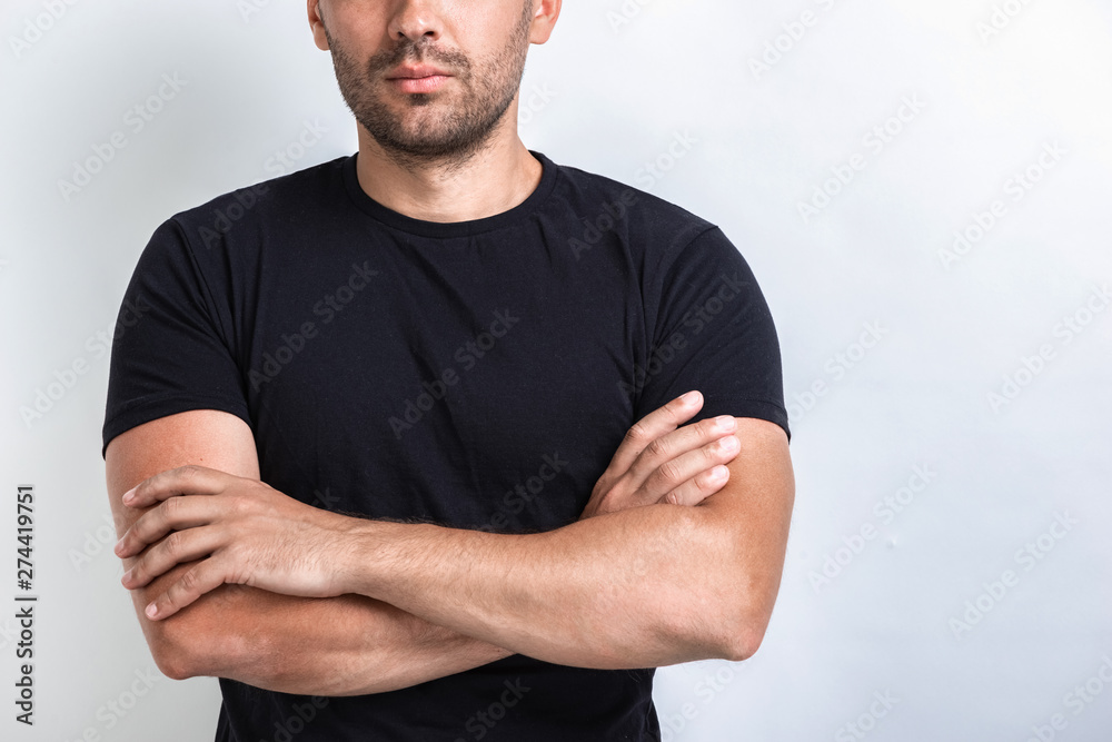 Cropping portrait of serious man folded hands.- Image Cropping portrait of serious man folded hands.- Image
