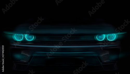 silhouette of black sports car with headlights on black background,