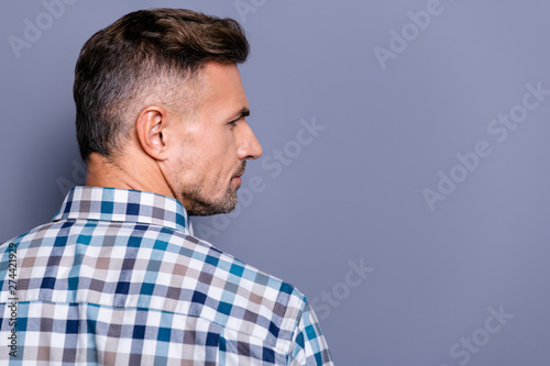 Close-up profile side portrait of his he nice attractive well-groomed experienced bearded guy wearing checked shirt isolated over gray blue violet purple pastel background