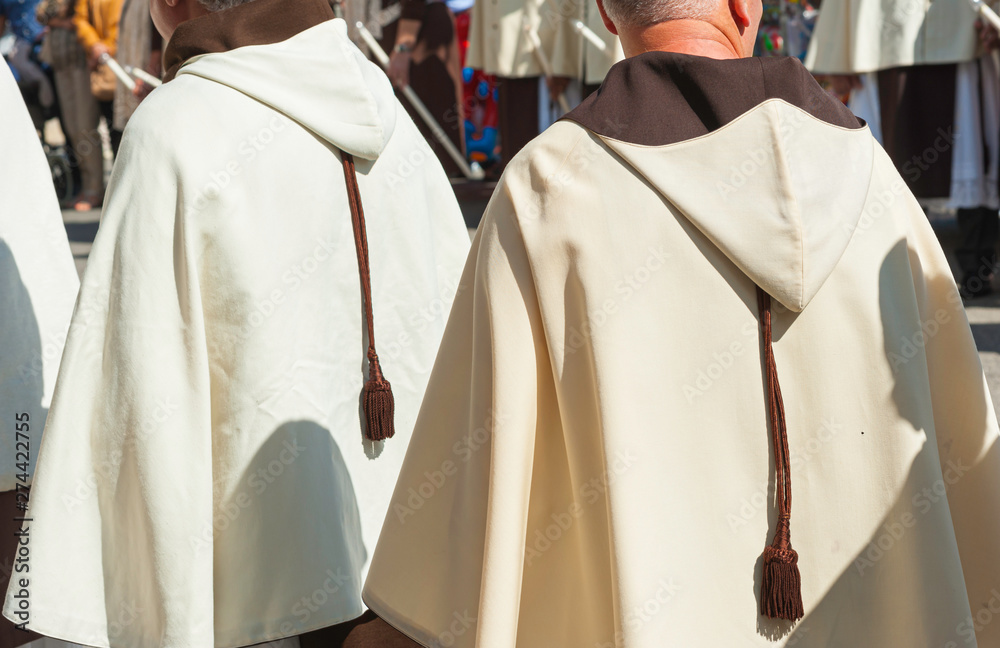 dress detail religious brotherhoods parading in a procession in celebration saint patron on apulia, Italy
