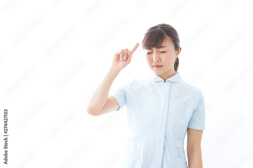 NOを示す若い看護師 NOを示す若い看護師