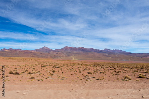 Background with barren desert scenery in the Bolivian Andes  in the Nature reserve Edoardo Avaroa