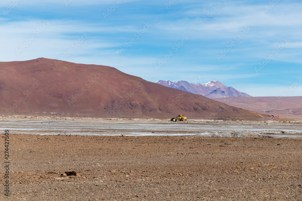 Background with barren desert scenery in the Bolivian Andes, in the Nature reserve Edoardo Avaroa