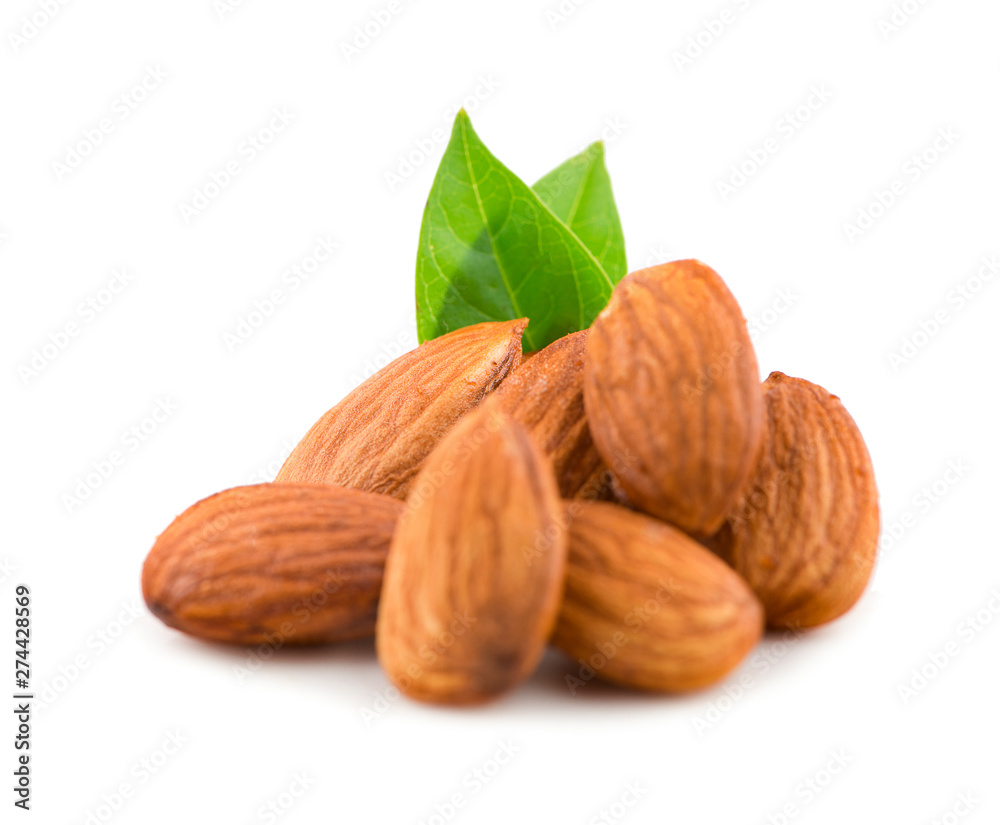 Group of almonds with leaves isolated on white background Group of almonds with leaves isolated on white background