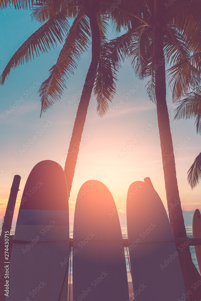 Surfboard and palm tree on beach background. Stock Photo | Adobe Stock